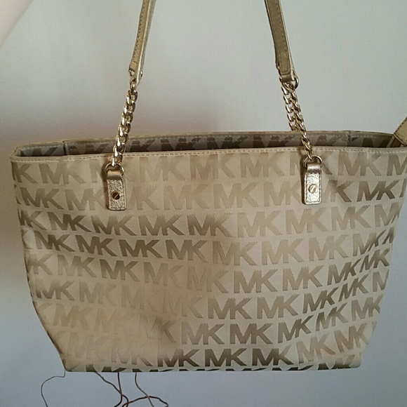 Michael Kors Handbags - Gold Michael Kors Initial zip up tote